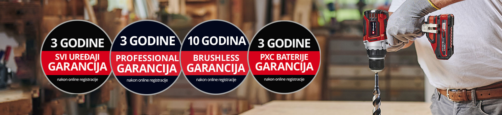Ovde možete videti čoveka u radionici sa Ajnhel bušilicom u upotrebi. Pored toga, na slici su postavljene ikone za različite vrste produženja garancije. Moguća su sledeća produženja garancije: „Svi uredaji “, „Professional garancija“, „Brushless Garancija“, „PXC Baterije“.