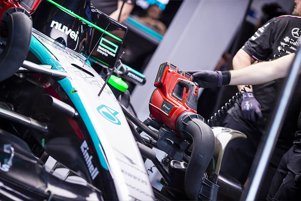 Einhell tool sitting on the Formula 1 mercedes race car