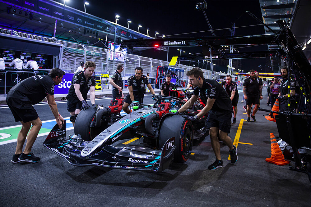 Formula 1 mercedes mechanics preparing the race car